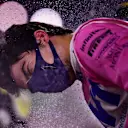 BAHRAIN, BAHRAIN - DECEMBER 06: Third placed Lance Stroll of Canada and Racing Point celebrates on the podium during the F1 Grand Prix of Sakhir at Bahrain International Circuit on December 06, 2020 in Bahrain, Bahrain. (Photo by Mario Renzi - Formula 1/Formula 1 via Getty Images)