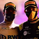 BAHRAIN, BAHRAIN - DECEMBER 06: Second placed Esteban Ocon of France and Renault Sport F1 and third placed Lance Stroll of Canada and Racing Point celebrate on the podium during the F1 Grand Prix of Sakhir at Bahrain International Circuit on December 06, 2020 in Bahrain, Bahrain. (Photo by Mario Renzi - Formula 1/Formula 1 via Getty Images)