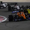 BAHRAIN, BAHRAIN - DECEMBER 06: Carlos Sainz of Spain driving the (55) McLaren F1 Team MCL35 Renault leads Daniel Ricciardo of Australia driving the (3) Renault Sport Formula One Team RS20 on track during the F1 Grand Prix of Sakhir at Bahrain International Circuit on December 06, 2020 in Bahrain, Bahrain. (Photo by Rudy Carezzevoli/Getty Images)