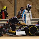 BAHRAIN, BAHRAIN - DECEMBER 06: Nicholas Latifi of Canada and Williams looks on as his car is taken away by track staff during the F1 Grand Prix of Sakhir at Bahrain International Circuit on December 06, 2020 in Bahrain, Bahrain. (Photo by Clive Mason - Formula 1/Formula 1 via Getty Images)
