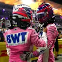 BAHRAIN, BAHRAIN - DECEMBER 06: Race winner Sergio Perez of Mexico and Racing Point and third placed Lance Stroll of Canada and Racing Point celebrate in parc ferme during the F1 Grand Prix of Sakhir at Bahrain International Circuit on December 06, 2020 in Bahrain, Bahrain. (Photo by Bryn Lennon/Getty Images)