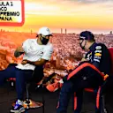 BARCELONA, SPAIN - AUGUST 15: Third placed qualifier Max Verstappen of Netherlands and Red Bull Racing and pole position qualifier Lewis Hamilton of Great Britain and Mercedes GP talk in the Drivers Press Conference during qualifying for the F1 Grand Prix of Spain at Circuit de Barcelona-Catalunya on August 15, 2020 in Barcelona, Spain. (Photo by Rudy Carezzevoli/Getty Images)
