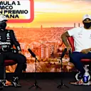 BARCELONA, SPAIN - AUGUST 15: Pole position qualifier Lewis Hamilton of Great Britain and Mercedes GP and second placed qualifier Valtteri Bottas of Finland and Mercedes GP talk in the Drivers Press Conference after qualifying for the F1 Grand Prix of Spain at Circuit de Barcelona-Catalunya on August 15, 2020 in Barcelona, Spain. (Photo by Rudy Carezzevoli/Getty Images)