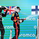 BARCELONA, SPAIN - AUGUST 16: Race winner Lewis Hamilton of Great Britain and Mercedes GP,  second placed Max Verstappen of Netherlands and Red Bull Racing and third placed Valtteri Bottas of Finland and Mercedes GP celebrate on the podium during the F1 Grand Prix of Spain at Circuit de Barcelona-Catalunya on August 16, 2020 in Barcelona, Spain. (Photo by Albert Gea/Pool via Getty Images)