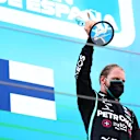 BARCELONA, SPAIN - AUGUST 16: Third placed Valtteri Bottas of Finland and Mercedes GP celebrates on the podium during the F1 Grand Prix of Spain at Circuit de Barcelona-Catalunya on August 16, 2020 in Barcelona, Spain. (Photo by Dan Istitene - Formula 1/Formula 1 via Getty Images)
