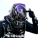 BARCELONA, SPAIN - AUGUST 16: Race winner Lewis Hamilton of Great Britain and Mercedes GP points to the 'Black Lives Matter' symbol on his helmet as he celebrates in parc ferme during the F1 Grand Prix of Spain at Circuit de Barcelona-Catalunya on August 16, 2020 in Barcelona, Spain. (Photo by Dan Istitene - Formula 1/Formula 1 via Getty Images)