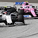 SPIELBERG, AUSTRIA - JULY 12: Pierre Gasly of France driving the (10) Scuderia AlphaTauri AT01 Honda battles for position with Lance Stroll of Canada driving the (18) Racing Point RP20 Mercedes during the Formula One Grand Prix of Styria at Red Bull Ring on July 12, 2020 in Spielberg, Austria. (Photo by Joe Klamar/Pool via Getty Images)