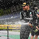 SPIELBERG, AUSTRIA - JULY 12: Second placed Valtteri Bottas of Finland and Mercedes GP celebrates on the podium after the Formula One Grand Prix of Styria at Red Bull Ring on July 12, 2020 in Spielberg, Austria. (Photo by Joe Klamar/Pool via Getty Images)