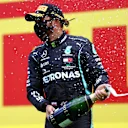 SPIELBERG, AUSTRIA - JULY 12: Lewis Hamilton of Great Britain and Mercedes GP celebrates on the podium after winning the Formula One Grand Prix of Styria at Red Bull Ring on July 12, 2020 in Spielberg, Austria. (Photo by Dan Istitene - Formula 1/Formula 1 via Getty Images)