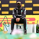 SPIELBERG, AUSTRIA - JULY 12: Race winner Lewis Hamilton of Great Britain and Mercedes GP celebrates on the podium during the Formula One Grand Prix of Styria at Red Bull Ring on July 12, 2020 in Spielberg, Austria. (Photo by Dan Istitene - Formula 1/Formula 1 via Getty Images)