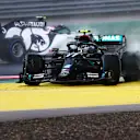 ISTANBUL, TURKEY - NOVEMBER 15: Valtteri Bottas of Finland driving the (77) Mercedes AMG Petronas F1 Team Mercedes W11 spins at the start during the F1 Grand Prix of Turkey at Intercity Istanbul Park on November 15, 2020 in Istanbul, Turkey. (Photo by Dan Istitene - Formula 1/Formula 1 via Getty Images)