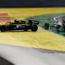 ISTANBUL, TURKEY - NOVEMBER 15: Valtteri Bottas of Finland driving the (77) Mercedes AMG Petronas F1 Team Mercedes W11 and Esteban Ocon of France driving the (31) Renault Sport Formula One Team RS20 spin off at the first corner at the start of the race during the F1 Grand Prix of Turkey at Intercity Istanbul Park on November 15, 2020 in Istanbul, Turkey. (Photo by Clive Mason/Getty Images)