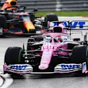 ISTANBUL, TURKEY - NOVEMBER 15: Sergio Perez of Mexico driving the (11) Racing Point RP20 Mercedes leads Alexander Albon of Thailand driving the (23) Aston Martin Red Bull Racing RB16 during the F1 Grand Prix of Turkey at Intercity Istanbul Park on November 15, 2020 in Istanbul, Turkey. (Photo by Clive Mason/Getty Images)