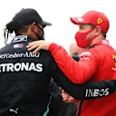 ISTANBUL, TURKEY - NOVEMBER 15: Race winner Lewis Hamilton of Great Britain and Mercedes GP celebrates winning a 7th F1 World Drivers Championship with third placed Sebastian Vettel of Germany and Ferrari in parc ferme during the F1 Grand Prix of Turkey at Intercity Istanbul Park on November 15, 2020 in Istanbul, Turkey. (Photo by Clive Mason/Getty Images)