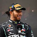 ISTANBUL, TURKEY - NOVEMBER 15: Race winner Lewis Hamilton of Great Britain and Mercedes GP talks to the media on the podium after winning a 7th F1 World Drivers Championship during the F1 Grand Prix of Turkey at Intercity Istanbul Park on November 15, 2020 in Istanbul, Turkey. (Photo by Clive Mason/Getty Images)