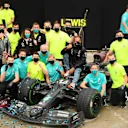 ISTANBUL, TURKEY - NOVEMBER 15: Race winner Lewis Hamilton of Great Britain and Mercedes GP celebrates winning a 7th F1 World Drivers Championship with his team in the Pitlane after the F1 Grand Prix of Turkey at Intercity Istanbul Park on November 15, 2020 in Istanbul, Turkey. (Photo by Clive Mason/Getty Images)