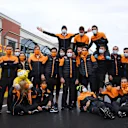 ISTANBUL, TURKEY - NOVEMBER 15: Lando Norris of Great Britain and McLaren F1 and team members pose with a Pudsey Bear toy on the grid after the F1 Grand Prix of Turkey at Intercity Istanbul Park on November 15, 2020 in Istanbul, Turkey. (Photo by Clive Mason/Getty Images)