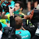 ISTANBUL, TURKEY - NOVEMBER 15: Race winner Lewis Hamilton of Great Britain and Mercedes GP celebrates winning a 7th F1 World Drivers Championship with his team in the Pitlane after the F1 Grand Prix of Turkey at Intercity Istanbul Park on November 15, 2020 in Istanbul, Turkey. (Photo by Joe Portlock - Formula 1/Formula 1 via Getty Images)
