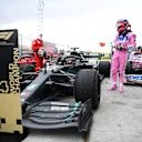ISTANBUL, TURKEY - NOVEMBER 15: Race winner Lewis Hamilton of Great Britain and Mercedes GP is congratulated by Sebastian Vettel of Germany and Ferrari and Sergio Perez of Mexico and Racing Point in parc ferme after winning a 7th F1 World Drivers Championship during the F1 Grand Prix of Turkey at Intercity Istanbul Park on November 15, 2020 in Istanbul, Turkey. (Photo by Clive Mason/Getty Images)