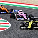 SCARPERIA, ITALY - SEPTEMBER 13: Daniel Ricciardo of Australia driving the (3) Renault Sport Formula One Team RS20 leads Sergio Perez of Mexico driving the (11) Racing Point RP20 Mercedes and Lando Norris of Great Britain driving the (4) McLaren F1 Team MCL35 Renault during the F1 Grand Prix of Tuscany at Mugello Circuit on September 13, 2020 in Scarperia, Italy. (Photo by Jenifer Lorenzini - Pool/Getty Images)