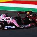SCARPERIA, ITALY - SEPTEMBER 13: Charles Leclerc of Monaco driving the (16) Scuderia Ferrari SF1000 and Sergio Perez of Mexico driving the (11) Racing Point RP20 Mercedes battle for position during the F1 Grand Prix of Tuscany at Mugello Circuit on September 13, 2020 in Scarperia, Italy. (Photo by Dan Istitene - Formula 1/Formula 1 via Getty Images)