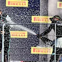 SCARPERIA, ITALY - SEPTEMBER 13: Race winner Lewis Hamilton of Great Britain and Mercedes GP and second placed Valtteri Bottas of Finland and Mercedes GP celebrate on the podium during the F1 Grand Prix of Tuscany at Mugello Circuit on September 13, 2020 in Scarperia, Italy. (Photo by Jenifer Lorenzini - Pool/Getty Images)