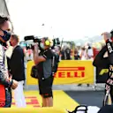 SCARPERIA, ITALY - SEPTEMBER 13: Third placed Alexander Albon of Thailand and Red Bull Racing speaks with race winner Lewis Hamilton of Great Britain and Mercedes GP in parc ferme during the F1 Grand Prix of Tuscany at Mugello Circuit on September 13, 2020 in Scarperia, Italy. (Photo by Bryn Lennon/Getty Images)