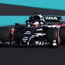 ABU DHABI, UNITED ARAB EMIRATES - DECEMBER 10: Yuki Tsunoda of Japan driving the (22) Scuderia AlphaTauri AT02 Honda during practice ahead of the F1 Grand Prix of Abu Dhabi at Yas Marina Circuit on December 10, 2021 in Abu Dhabi, United Arab Emirates. (Photo by Lars Baron/Getty Images)