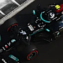 ABU DHABI, UNITED ARAB EMIRATES - DECEMBER 11: Valtteri Bottas of Finland driving the (77) Mercedes AMG Petronas F1 Team Mercedes W12 during final practice ahead of the F1 Grand Prix of Abu Dhabi at Yas Marina Circuit on December 11, 2021 in Abu Dhabi, United Arab Emirates. (Photo by Mark Thompson/Getty Images)