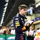 ABU DHABI, UNITED ARAB EMIRATES - DECEMBER 11: Pole position qualifier Max Verstappen of Netherlands and Red Bull Racing looks on in parc ferme  during qualifying ahead of the F1 Grand Prix of Abu Dhabi at Yas Marina Circuit on December 11, 2021 in Abu Dhabi, United Arab Emirates. (Photo by Mark Thompson/Getty Images)