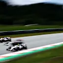 SPIELBERG, AUSTRIA - JULY 03: Mick Schumacher of Germany driving the (47) Haas F1 Team VF-21 Ferrari passes Antonio Giovinazzi of Italy driving the (99) Alfa Romeo Racing C41 Ferrari and Nikita Mazepin of Russia driving the (9) Haas F1 Team VF-21 Ferrari during final practice ahead of the F1 Grand Prix of Austria at Red Bull Ring on July 03, 2021 in Spielberg, Austria. (Photo by Bryn Lennon/Getty Images)