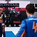 SPIELBERG, AUSTRIA - JULY 03: Pole position qualifier Max Verstappen of Netherlands and Red Bull Racing talks to the media in parc ferme during qualifying ahead of the F1 Grand Prix of Austria at Red Bull Ring on July 03, 2021 in Spielberg, Austria. (Photo by Christian Bruna - Pool/Getty Images)