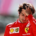 SPIELBERG, AUSTRIA - JULY 03: Carlos Sainz of Spain and Ferrari looks dejected in the Pitlane during qualifying ahead of the F1 Grand Prix of Austria at Red Bull Ring on July 03, 2021 in Spielberg, Austria. (Photo by Mark Thompson/Getty Images)