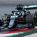 SPIELBERG, AUSTRIA - JULY 04: Lance Stroll of Canada driving the (18) Aston Martin AMR21 Mercedes during the F1 Grand Prix of Austria at Red Bull Ring on July 04, 2021 in Spielberg, Austria. (Photo by Clive Mason - Formula 1/Formula 1 via Getty Images)