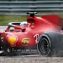 SPIELBERG, AUSTRIA - JULY 04: Charles Leclerc of Monaco driving the (16) Scuderia Ferrari SF21 runs wide during the F1 Grand Prix of Austria at Red Bull Ring on July 04, 2021 in Spielberg, Austria. (Photo by Clive Mason - Formula 1/Formula 1 via Getty Images)
