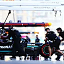 BAKU, AZERBAIJAN - JUNE 05: Lewis Hamilton of Great Britain driving the (44) Mercedes AMG Petronas F1 Team Mercedes W12 is pushed back into the garage during qualifying ahead of the F1 Grand Prix of Azerbaijan at Baku City Circuit on June 05, 2021 in Baku, Azerbaijan. (Photo by Dan Istitene - Formula 1/Formula 1 via Getty Images)