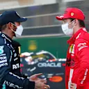 BAKU, AZERBAIJAN - JUNE 05: Second placed qualifier Lewis Hamilton of Great Britain and Mercedes GP talks with pole position qualifier Charles Leclerc of Monaco and Ferrari in parc ferme during qualifying ahead of the F1 Grand Prix of Azerbaijan at Baku City Circuit on June 05, 2021 in Baku, Azerbaijan. (Photo by Maxim Shemetov - Pool/Getty Images)