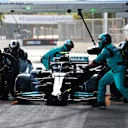 BAKU, AZERBAIJAN - JUNE 06: Valtteri Bottas of Finland driving the (77) Mercedes AMG Petronas F1 Team Mercedes W12 makes a pitstop during the F1 Grand Prix of Azerbaijan at Baku City Circuit on June 06, 2021 in Baku, Azerbaijan. (Photo by Mark Thompson/Getty Images)