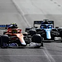 BAKU, AZERBAIJAN - JUNE 06: Lando Norris of Great Britain driving the (4) McLaren F1 Team MCL35M Mercedes and Fernando Alonso of Spain driving the (14) Alpine A521 Renault on track during the F1 Grand Prix of Azerbaijan at Baku City Circuit on June 06, 2021 in Baku, Azerbaijan. (Photo by Francois Nel/Getty Images)