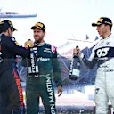 BAKU, AZERBAIJAN - JUNE 06: Race winner Sergio Perez of Mexico and Red Bull Racing, second placed Sebastian Vettel of Germany and Aston Martin F1 Team and third placed Pierre Gasly of France and Scuderia AlphaTauri celebrate on the podium during the F1 Grand Prix of Azerbaijan at Baku City Circuit on June 06, 2021 in Baku, Azerbaijan. (Photo by Dan Istitene - Formula 1/Formula 1 via Getty Images)