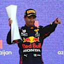 BAKU, AZERBAIJAN - JUNE 06: Race winner Sergio Perez of Mexico and Red Bull Racing celebrates on the podium during the F1 Grand Prix of Azerbaijan at Baku City Circuit on June 06, 2021 in Baku, Azerbaijan. (Photo by Francois Nel/Getty Images)
