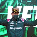 BAKU, AZERBAIJAN - JUNE 06: Second placed Sebastian Vettel of Germany and Aston Martin F1 Team celebrates on the podium during the F1 Grand Prix of Azerbaijan at Baku City Circuit on June 06, 2021 in Baku, Azerbaijan. (Photo by Francois Nel/Getty Images)