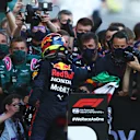 BAKU, AZERBAIJAN - JUNE 06: Race winner Sergio Perez of Mexico and Red Bull Racing celebrates in parc ferme during the F1 Grand Prix of Azerbaijan at Baku City Circuit on June 06, 2021 in Baku, Azerbaijan. (Photo by Joe Portlock - Formula 1/Formula 1 via Getty Images)