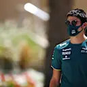 BAHRAIN, BAHRAIN - MARCH 27: Lance Stroll of Canada and Aston Martin F1 Team walks in the Paddock before final practice ahead of the F1 Grand Prix of Bahrain at Bahrain International Circuit on March 27, 2021 in Bahrain, Bahrain. (Photo by Mark Thompson/Getty Images)