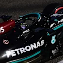 BAHRAIN, BAHRAIN - MARCH 27: Lewis Hamilton of Great Britain driving the (44) Mercedes AMG Petronas F1 Team Mercedes W12 on track during final practice ahead of the F1 Grand Prix of Bahrain at Bahrain International Circuit on March 27, 2021 in Bahrain, Bahrain. (Photo by Mario Renzi - Formula 1/Formula 1 via Getty Images)