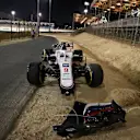 BAHRAIN, BAHRAIN - MARCH 28: The abandoned car of Nikita Mazepin of Russia and Haas F1 is seen at the side of the track after a colllision earlier in the race during the F1 Grand Prix of Bahrain at Bahrain International Circuit on March 28, 2021 in Bahrain, Bahrain. (Photo by Bryn Lennon/Getty Images)