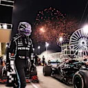 BAHRAIN, BAHRAIN - MARCH 28: Race winner Lewis Hamilton of Great Britain and Mercedes GP looks on in parc ferme during the F1 Grand Prix of Bahrain at Bahrain International Circuit on March 28, 2021 in Bahrain, Bahrain. (Photo by Lars Baron/Getty Images)