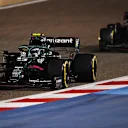 BAHRAIN, BAHRAIN - MARCH 28: Sebastian Vettel of Germany driving the (5) Aston Martin AMR21 Mercedes leads Lance Stroll of Canada driving the (18) Aston Martin AMR21 Mercedes on track during the F1 Grand Prix of Bahrain at Bahrain International Circuit on March 28, 2021 in Bahrain, Bahrain. (Photo by Clive Mason - Formula 1/Formula 1 via Getty Images)
