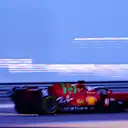 Leclerc's Ferrari contrasts with the Sakhir sky in the evening