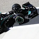 Bottas pulls out of hit garage ready for another run